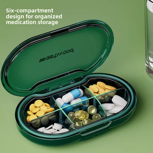 Open six grid oval pill organizer filled with sorted tablets and capsules