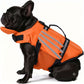 Dog flotation vest shown in a bright color with reflective safety strips
