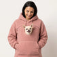 Pink teddy fleece hoodie with a small dog's head looking out of the chest opening above the front pocket