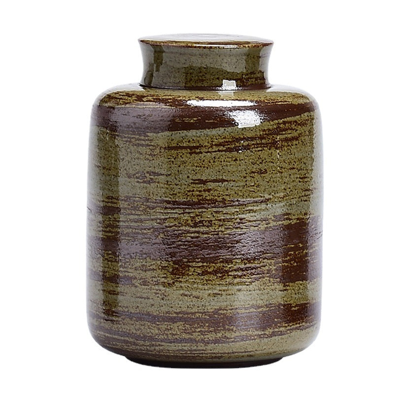 Ceramic storage jar side profile showing the snug sealing lid and matte glaze