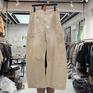Cream carpenter pants back view showing patch pockets and wide barrel leg
