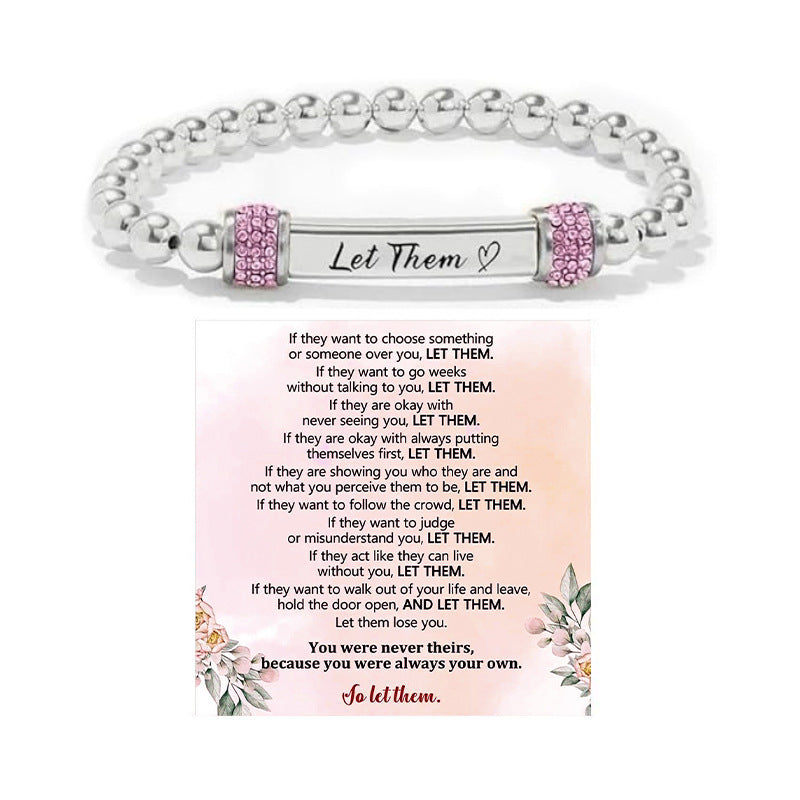 Silver bead bracelet with an engraved bar and pink pave cubic zirconia rondelles