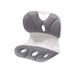Lumbar support cushion in use against the lower back while seated