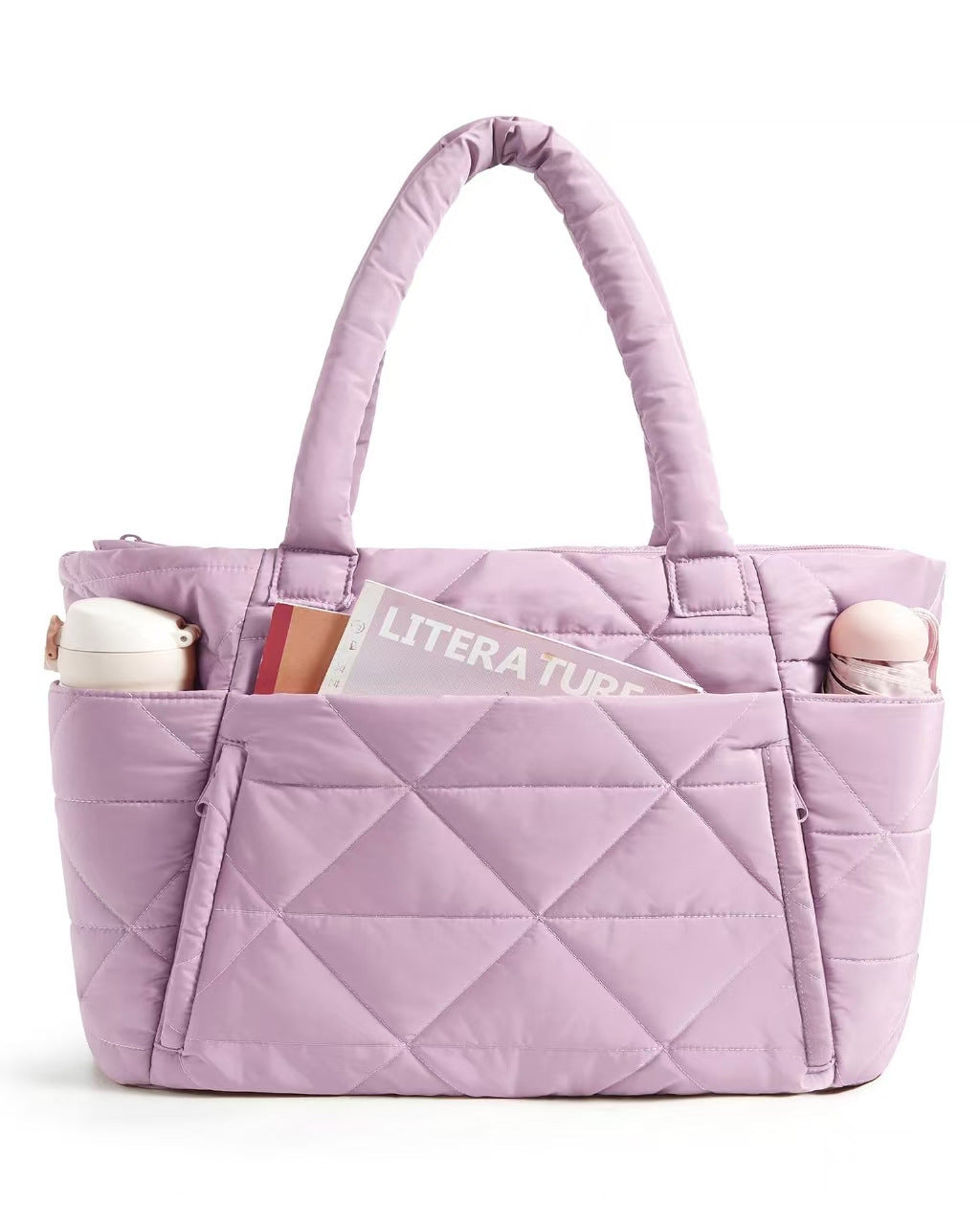 Close view of the diamond quilting and stitching on the padded nylon shoulder bag