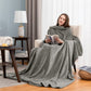 Woman reading in an armchair in a gray plain flannel sleeved blanket draped over her lap, Flannel gray option