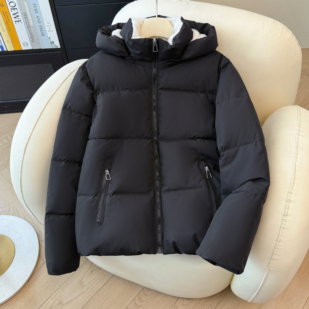 Padded winter puffer jacket with a detachable hood and two zippered front pockets