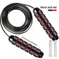 Black and red weighted skipping rope shown with its two removable metal bars