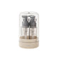 Four 35ml press pump and mist travel bottles in a round base