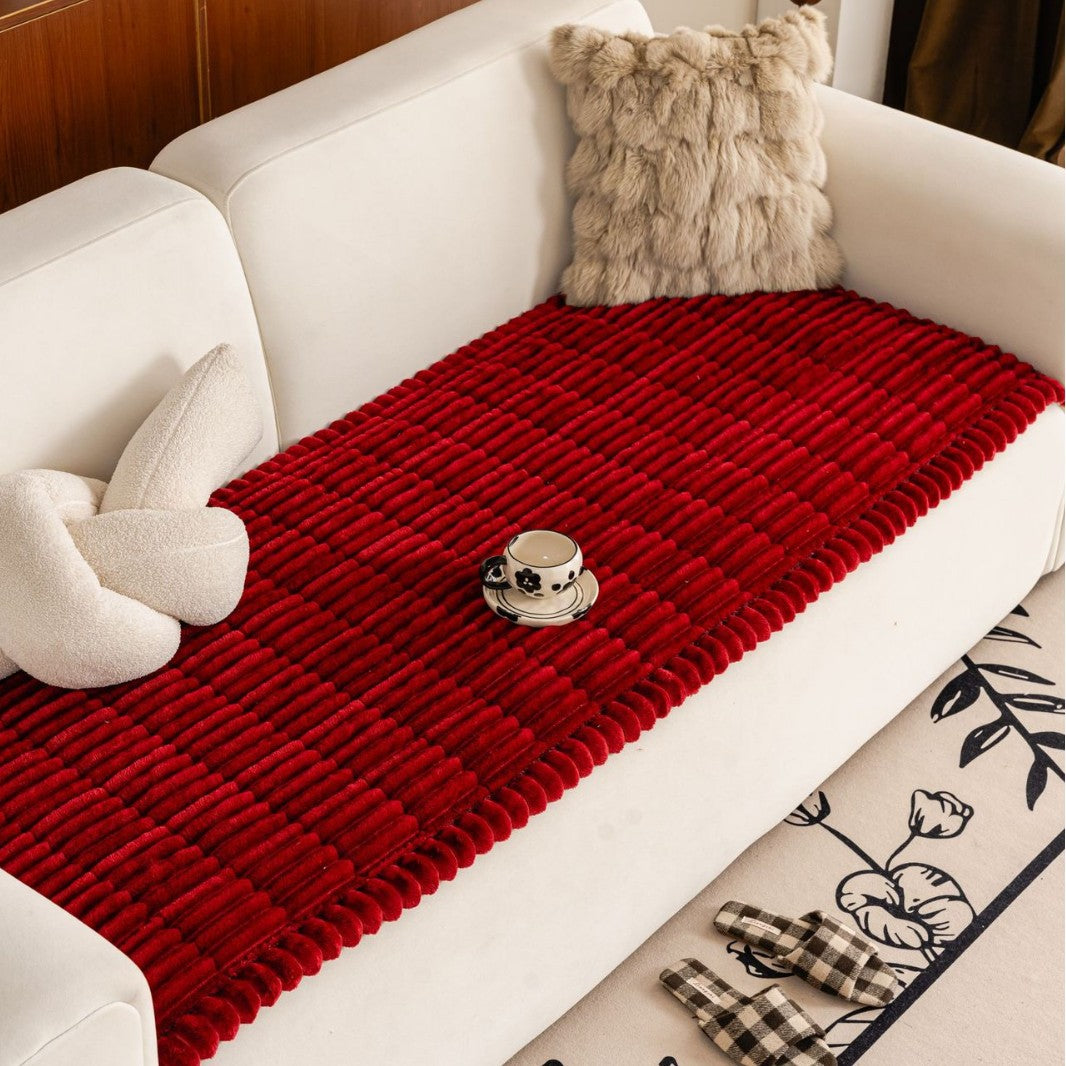 Sweet Serene Red quilted plush sofa cover on a sofa, 90 x 120 cm