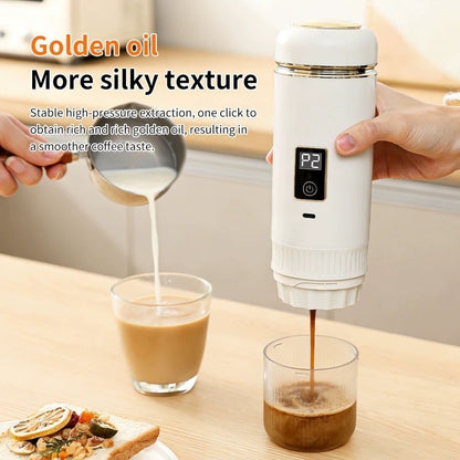 White handheld electric espresso maker pouring a fresh shot into a glass on a kitchen counter