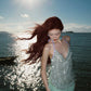Sequin gown laid flat showing full silhouette and hem