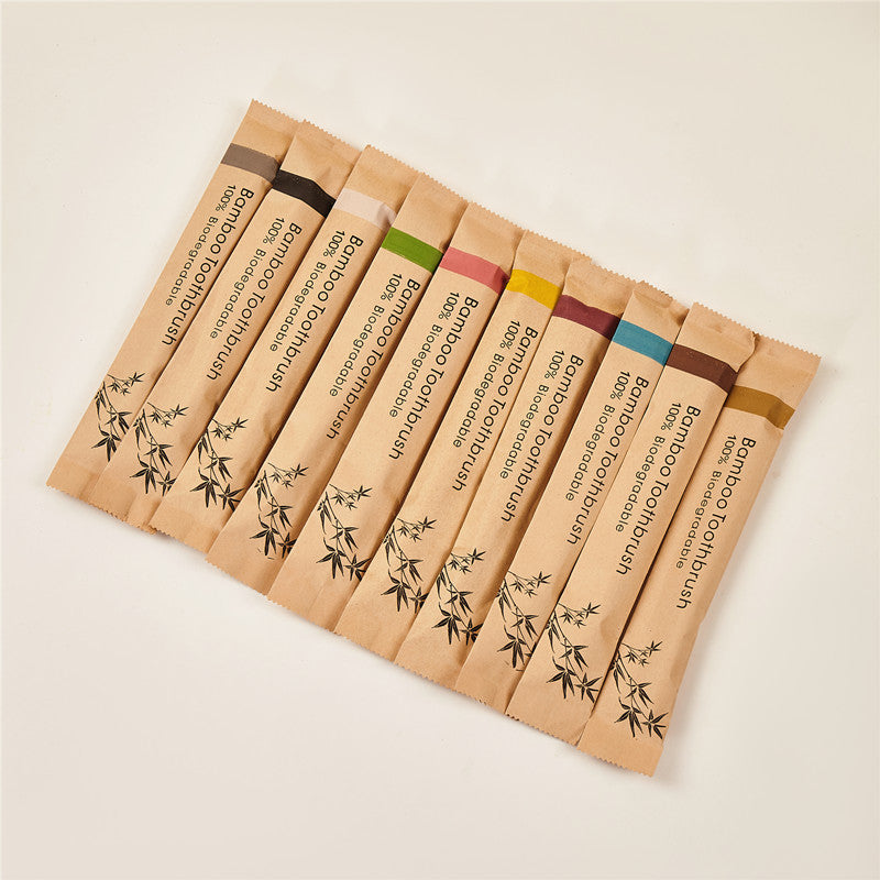 Bamboo handle toothbrush with soft nylon bristles shown on a plain background