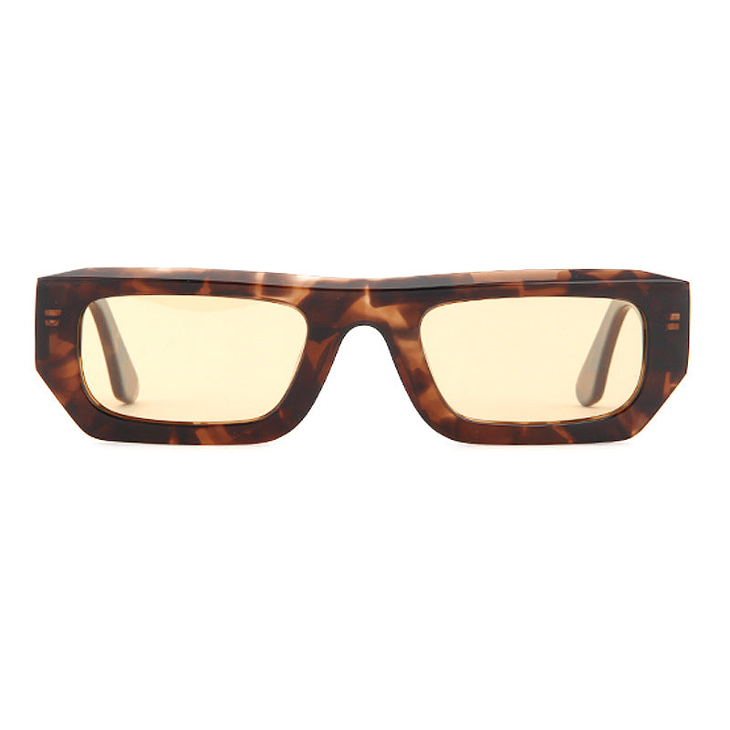 Translucent pink rectangular sunglasses with polarized lenses