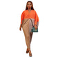 Pleated batwing midi dress with all over accordion pleats on a standing model, full length