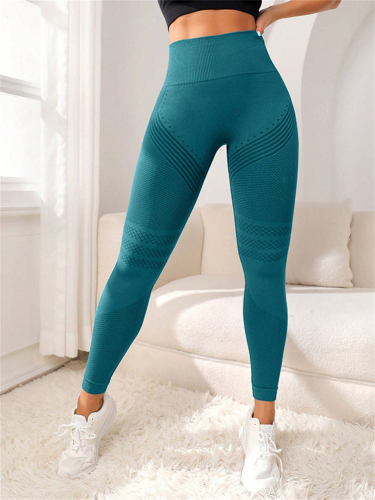 Womens yoga leggings with a wide high waistband and a scrunch back seam