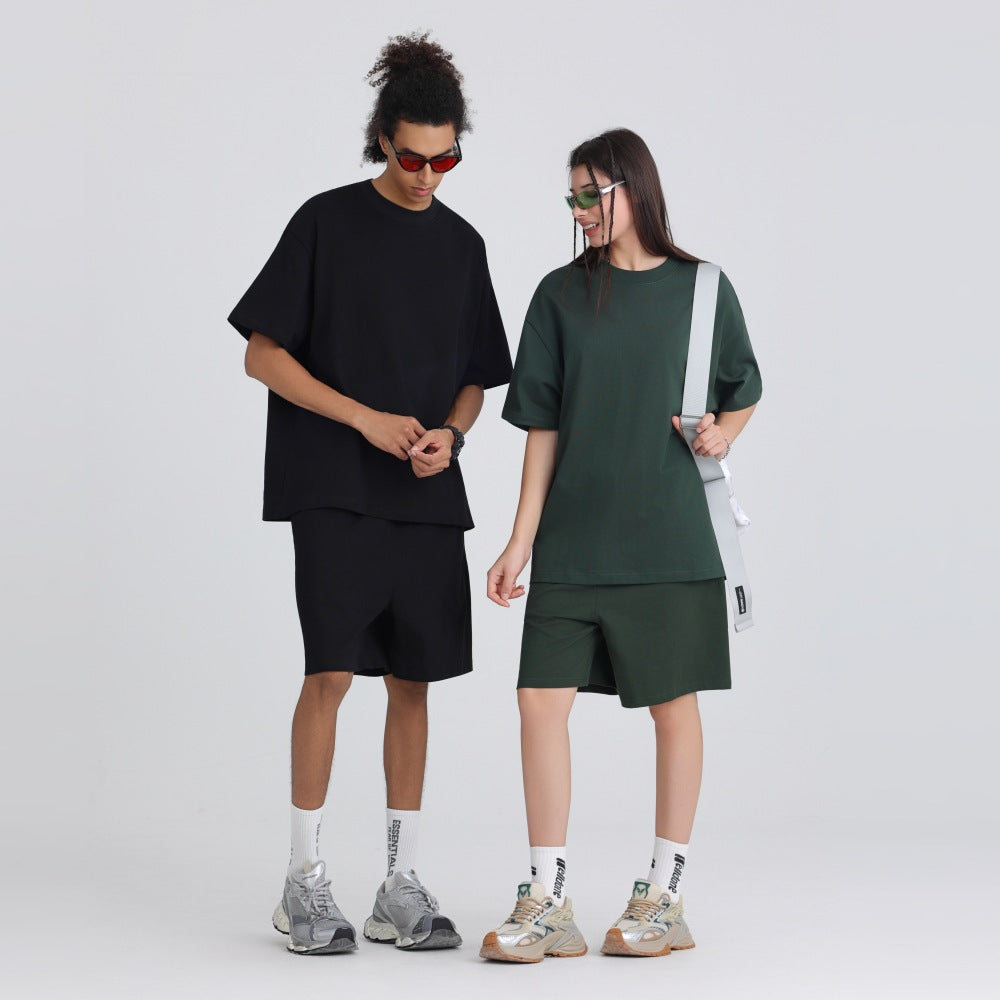 Model wearing the oversized heavyweight cotton crew neck tee with a relaxed drop shoulder cut