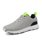 Side profile of breathable golf shoes showing the lace-up mesh upper and cushioned sole