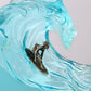 Clear resin wave sculpture with surfer whale shark and jellyfish on wood base