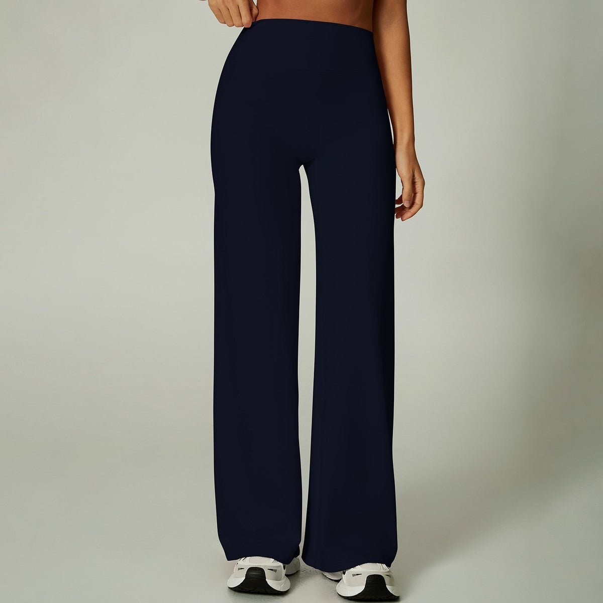 Womens high waisted wide leg stretch pants shown on a model