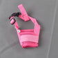Adjustable soft dog muzzle laid flat to show the cup and head strap