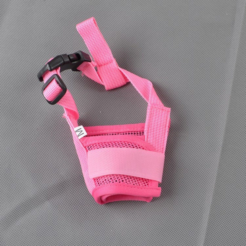 Adjustable soft dog muzzle laid flat to show the cup and head strap
