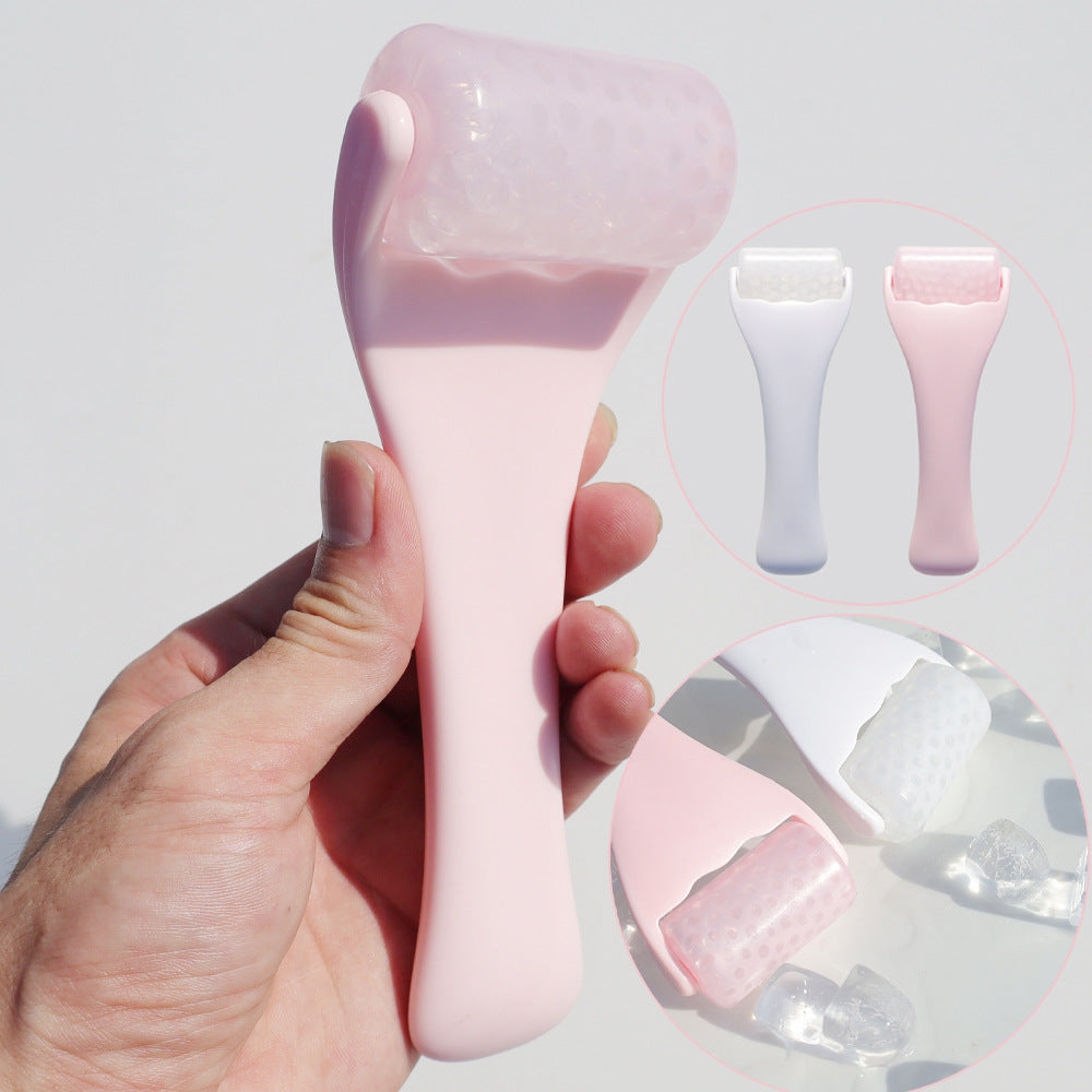 Pink gel ice roller facial massage tool shown from the front
