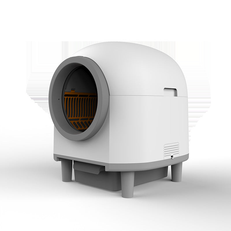 Cat stepping into the automatic self-cleaning litter box chamber