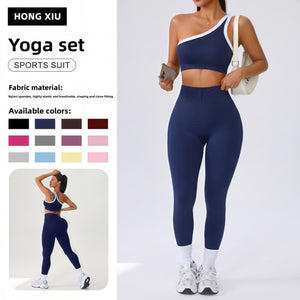 Woman wearing the one shoulder color blocked yoga set, crop bra and high waist leggings