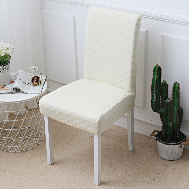 Diamond jacquard chair cover fitted to a dining chair back