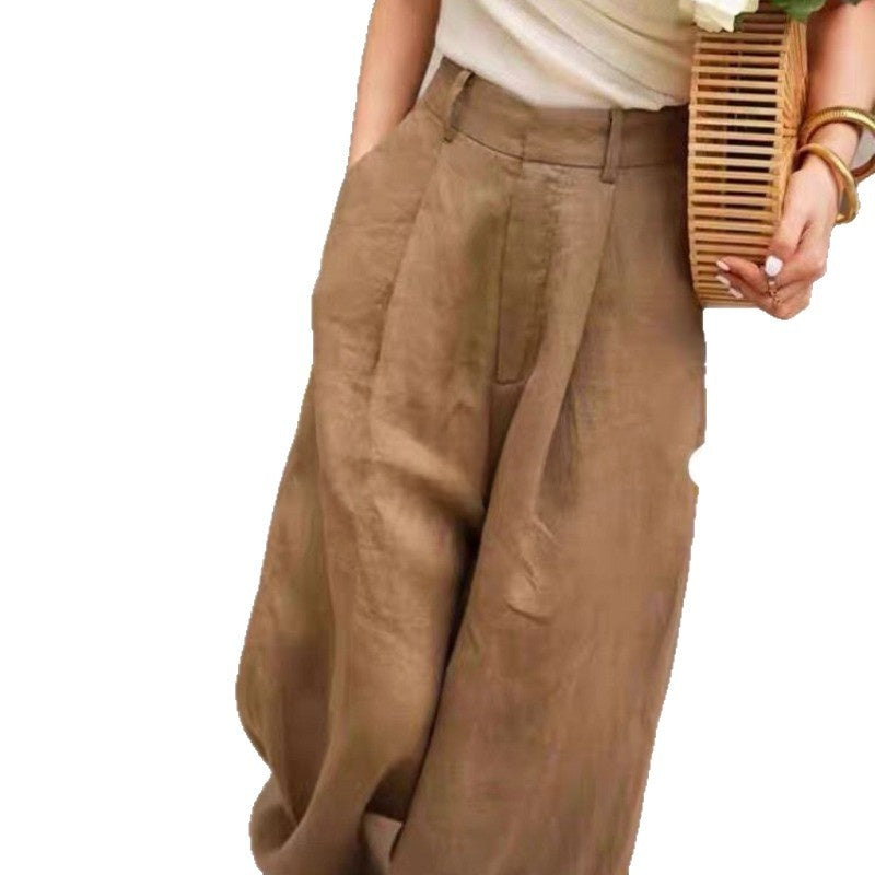 Close view of coffee brown cotton linen weave on high waist wide leg trousers