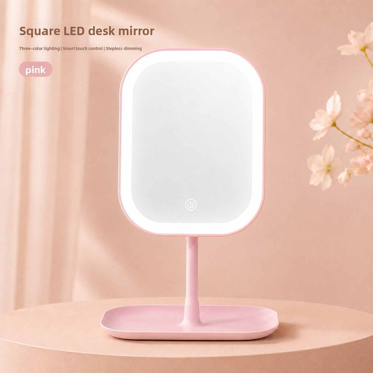 Square peach pink LED desk mirror on a pink tray base with blossom branches, peach pink option