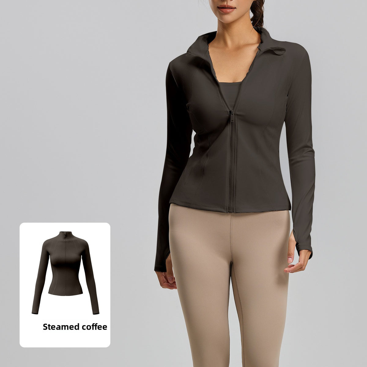 Woman in a dark brown slim fit stand collar zip jacket worn over a top, brown swatch inset at the corner