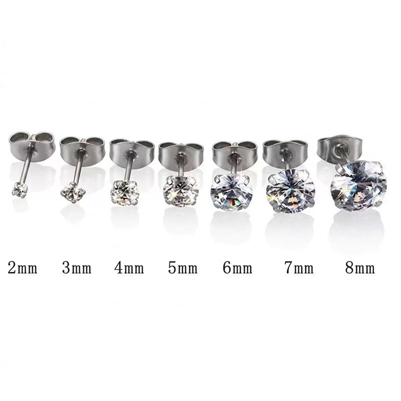 Cubic zirconia studs in several stone sizes lined up for comparison