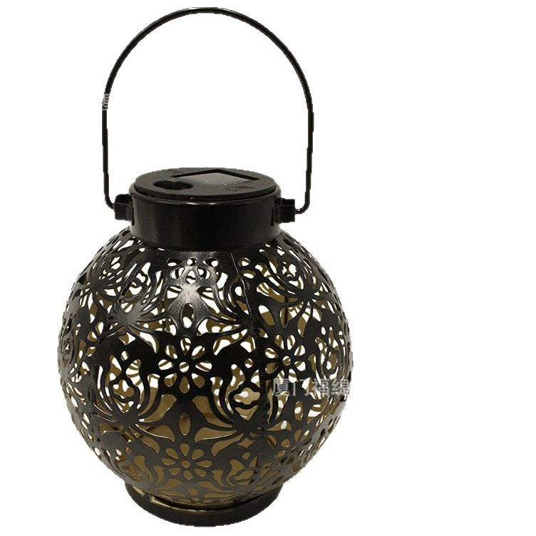 Solar Garden Projection Lamp | hanging from tree branch lifestyle
