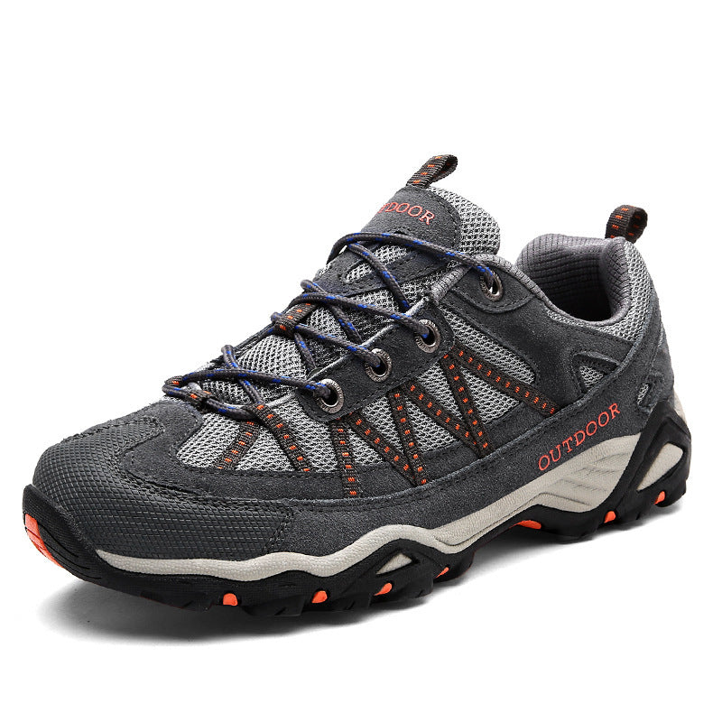 Unisex outdoor hiking shoe with a mesh and suede upper and a lugged rubber outsole