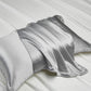 Close view of the sheen and weave of a mulberry silk pillowcase
