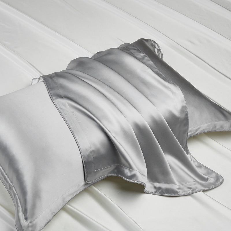Close view of the sheen and weave of a mulberry silk pillowcase