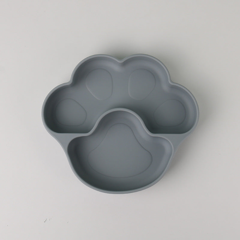 Dark blue gray bear paw plate alone, with a wide pad and a toe section, on a gray background