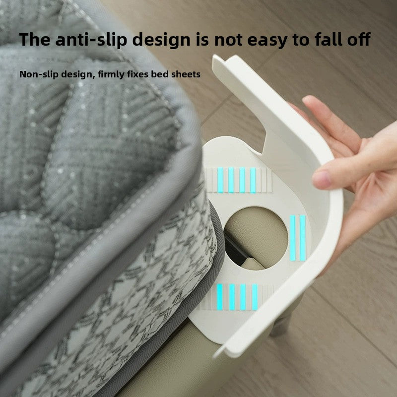 Side profile of the bed sheet holder showing the raised peg and non slip base