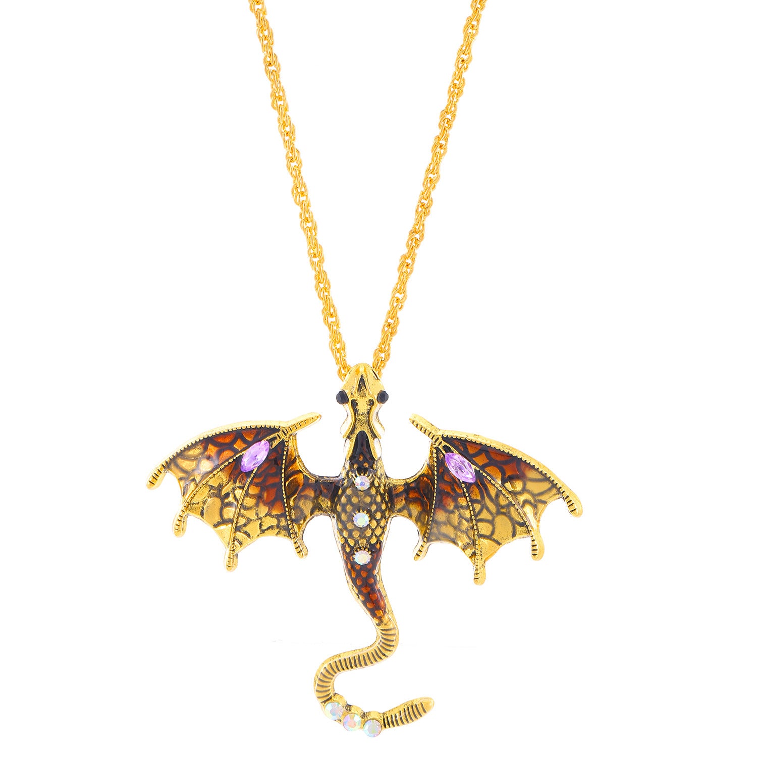 Scale reference close up of the cast dragon charm in antiqued metal