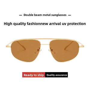Gold metal frame sunglasses with tea lens detail view