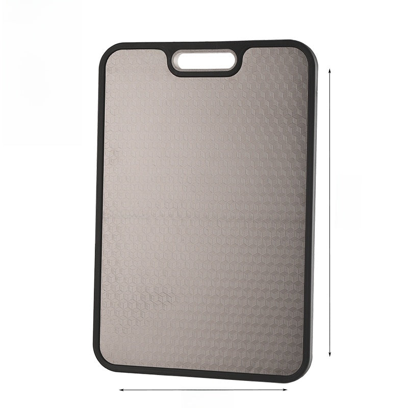 Top-down view of the titanium cutting board surface and cut-out handle