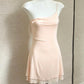 Ballet pink silky slip nightgown on a mannequin showing the short A-line layered hem