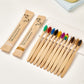 Close view of soft colored bristles on a bamboo toothbrush head