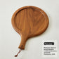 Close detail of the solid walnut wood grain and 2 cm edge of the cutting board