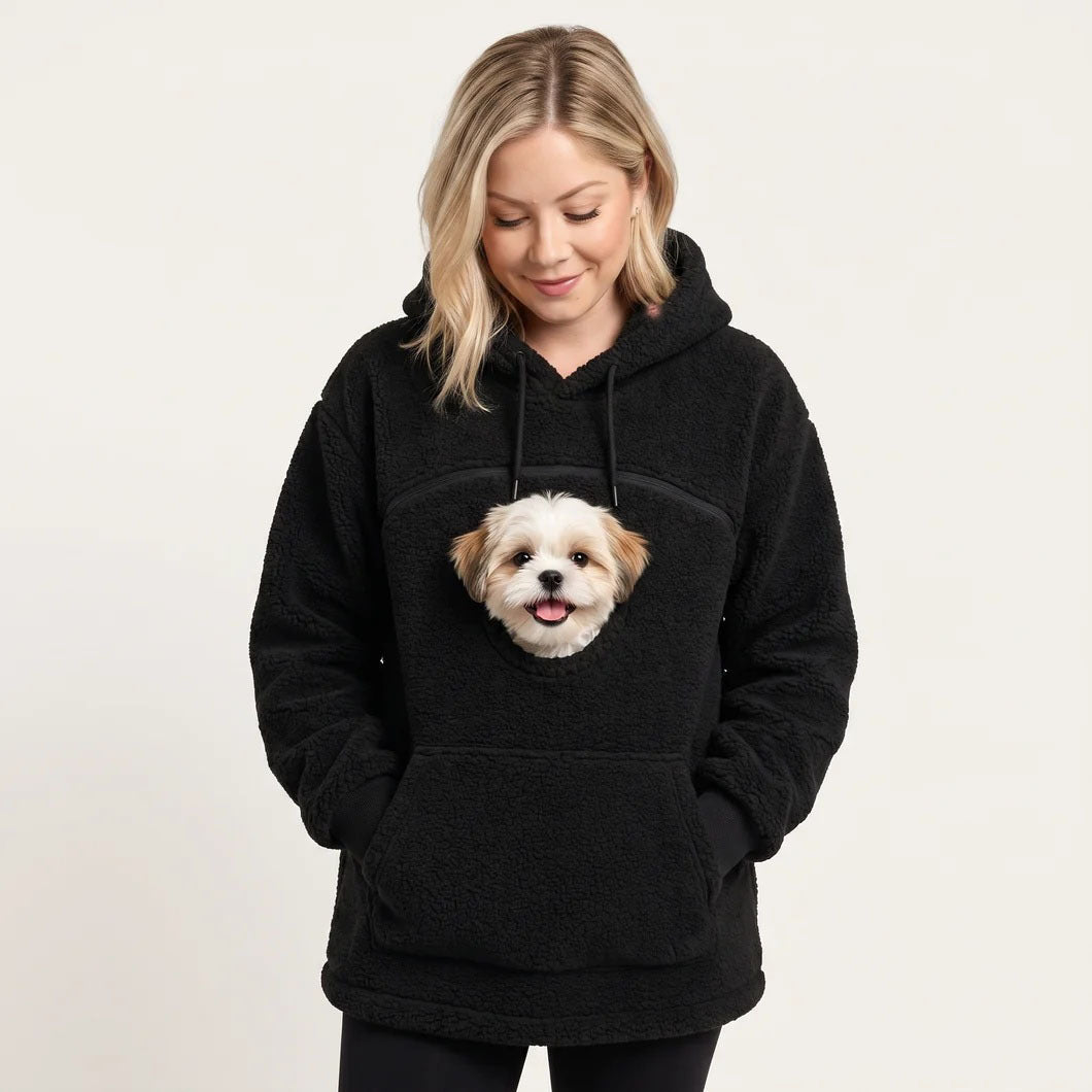 Black teddy fleece hoodie with a small dog's head looking out of the chest opening above the front pocket
