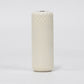 White ribbed handheld vacuum sealer body on a plain background