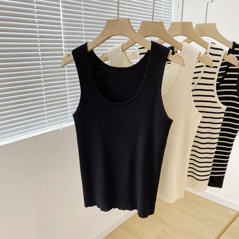 Striped sleeveless camisole top shown laid out flat