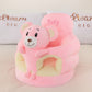 Plush baby floor seat with an animal at the front and a soft padded ring for a baby to sit in