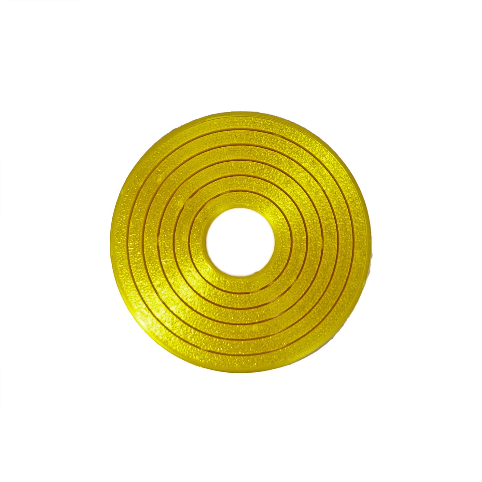 Yellow gold gyro ring fidget lying flat, concentric printed rings on a white ground
